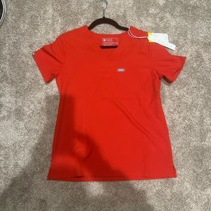 Orange tech Figs never before worn!